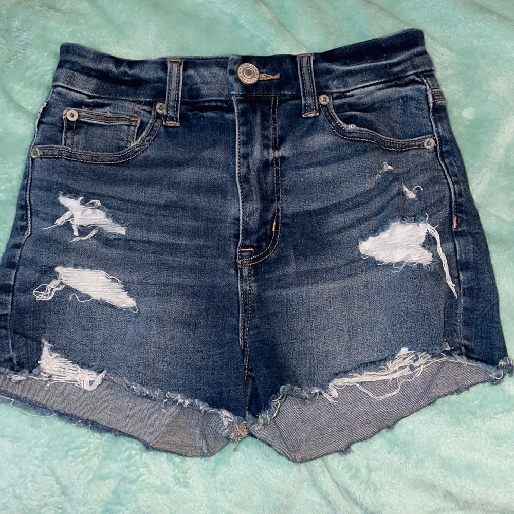 Jean shorts with rips from American Eagle.